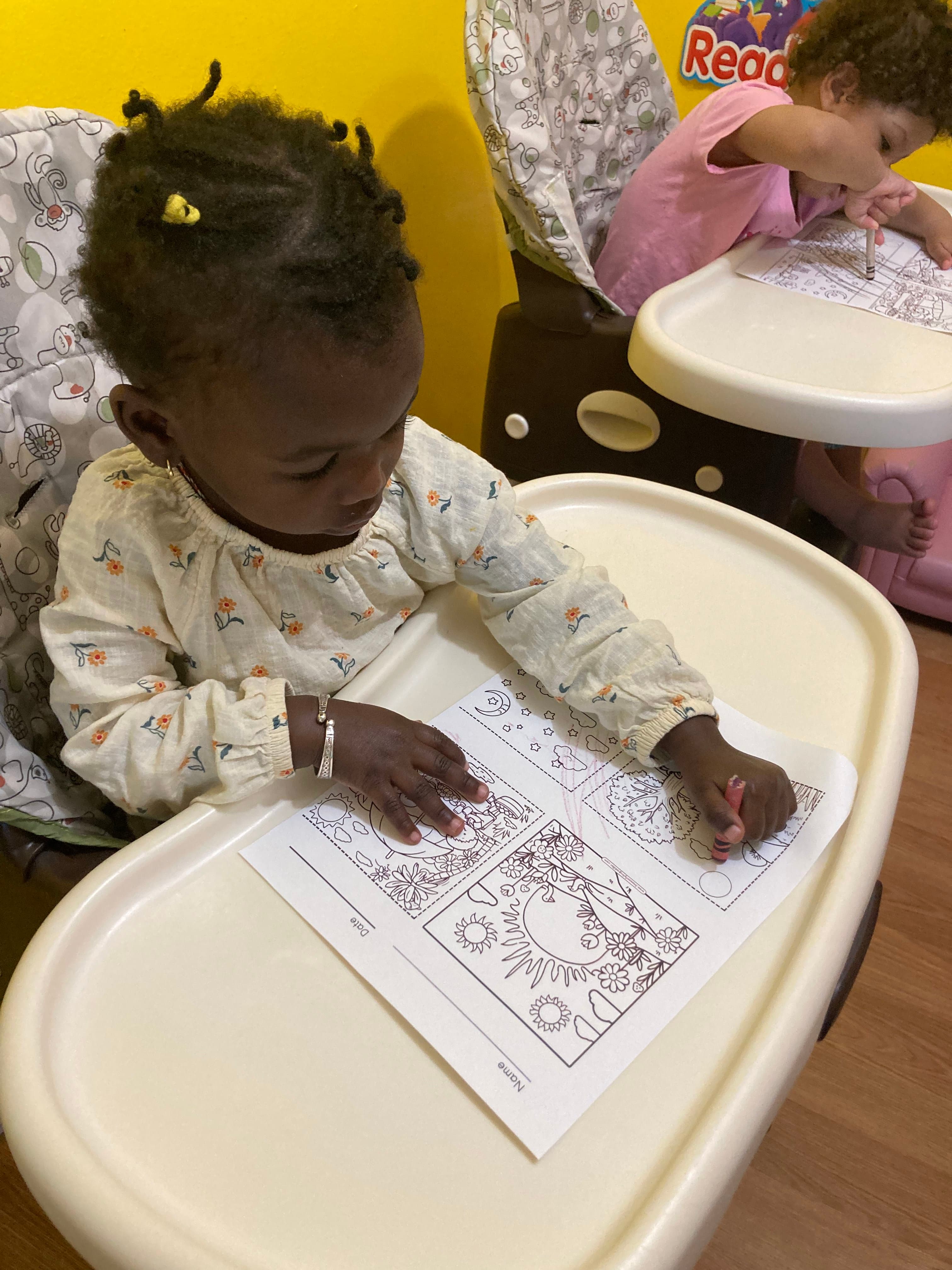 Kid working on worksheet